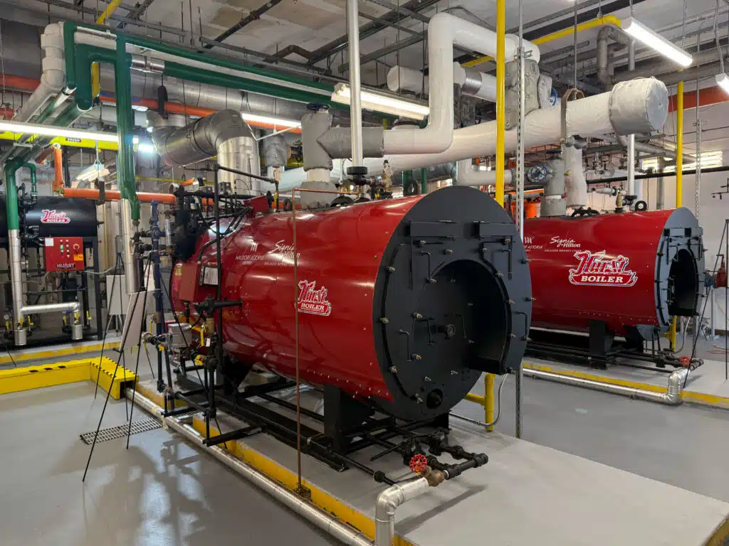 Two Hurst Series 500 four-pass wet-back boilers sit proudly in the newly renovated boiler room at The Waldorf Astoria.